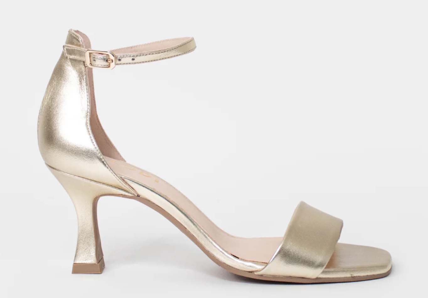 The Charm of High Heels: Unveiling Stilettos, Strappy Sandals, and Bow Accents